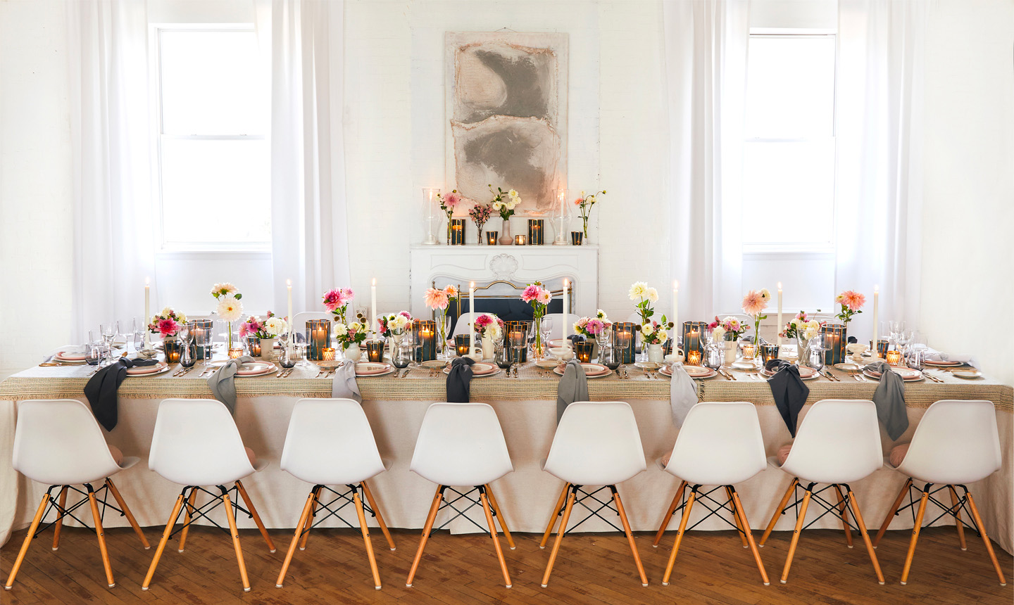 A table beautifully set for dinner at bridal shower in the Loft