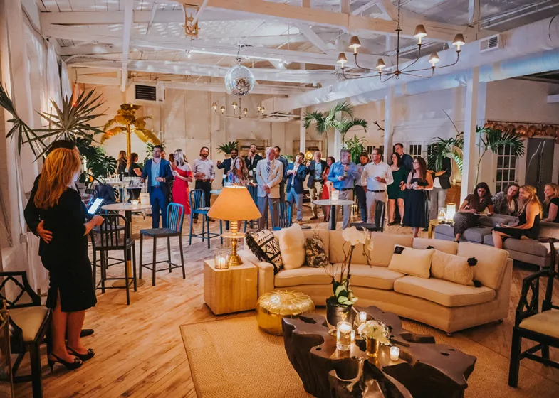 Guests at a birthday party in the Loft with a disco ball 
