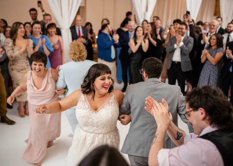 Dancing revelry during a wedding reception in the Gallery