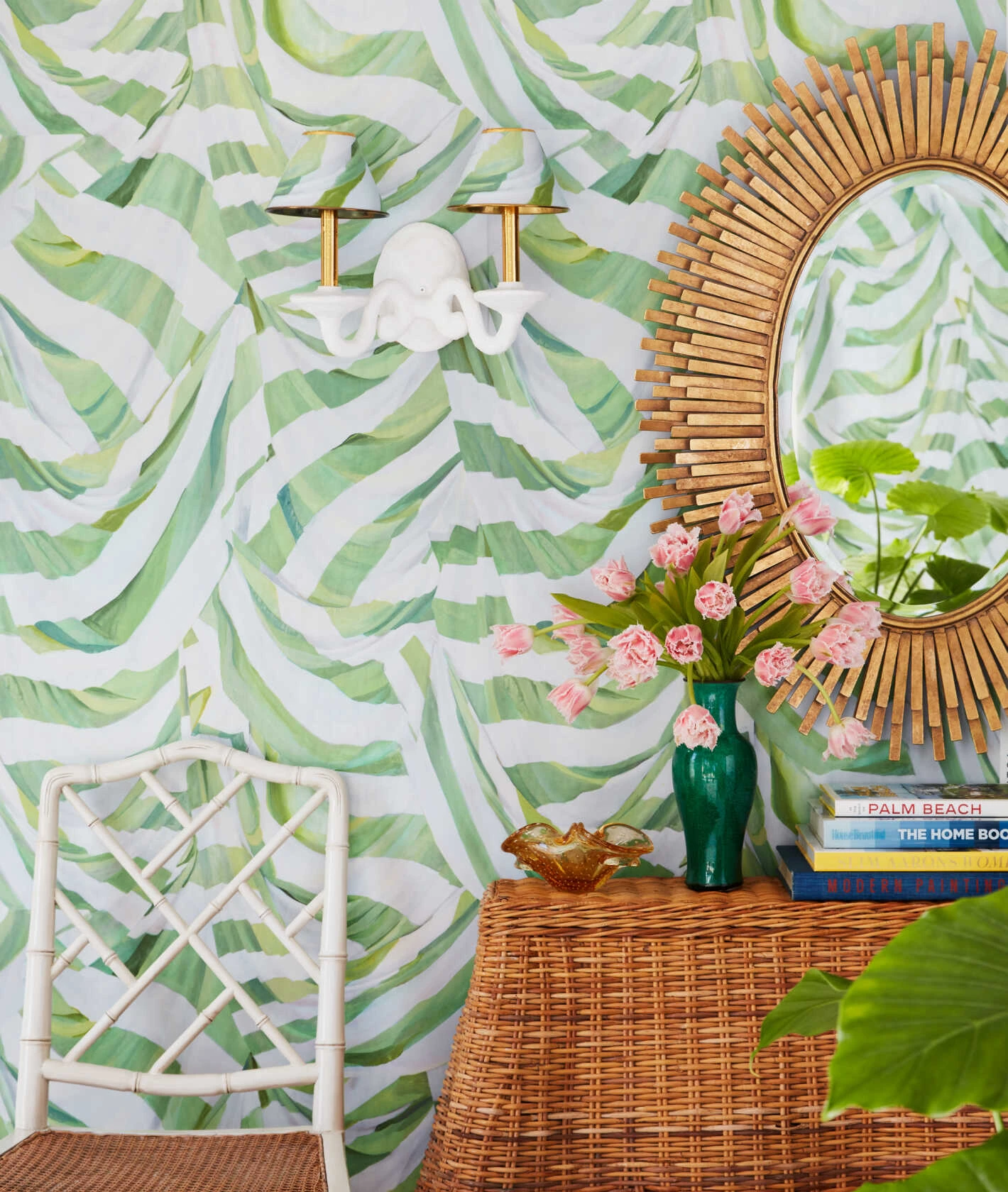 Foyer vignette with mirror and rattan console table