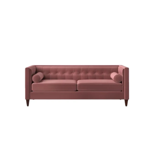 Pink tufted sofa