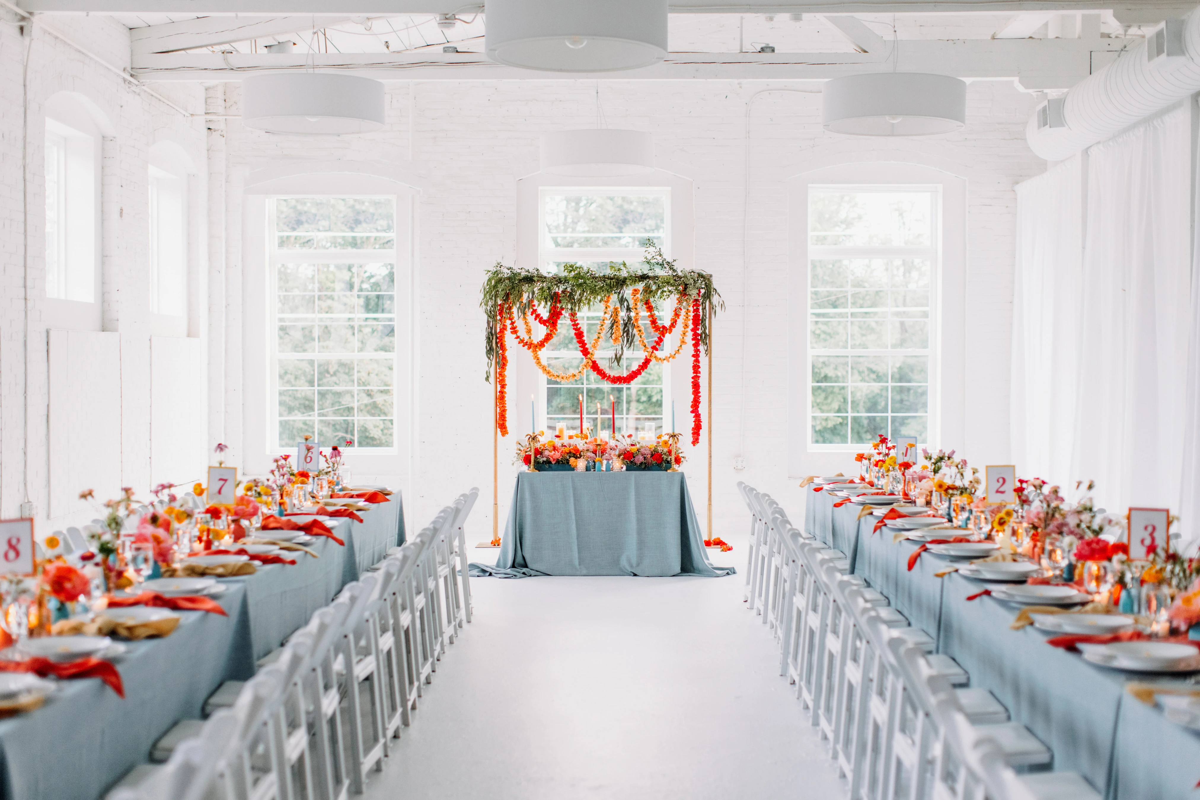 A seating group in the Loft decorated for a birthday party with a tropical theme