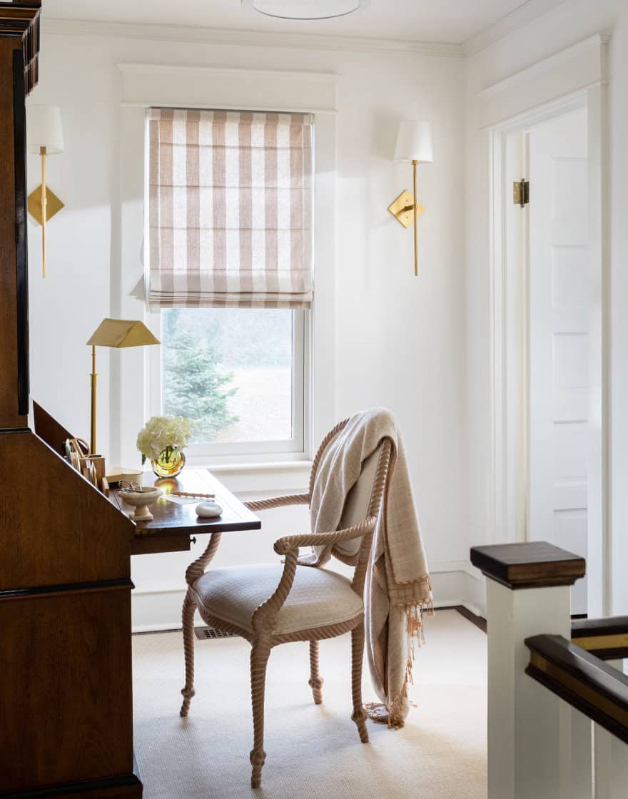 Bedroom landing with striped fabric motorized window shade