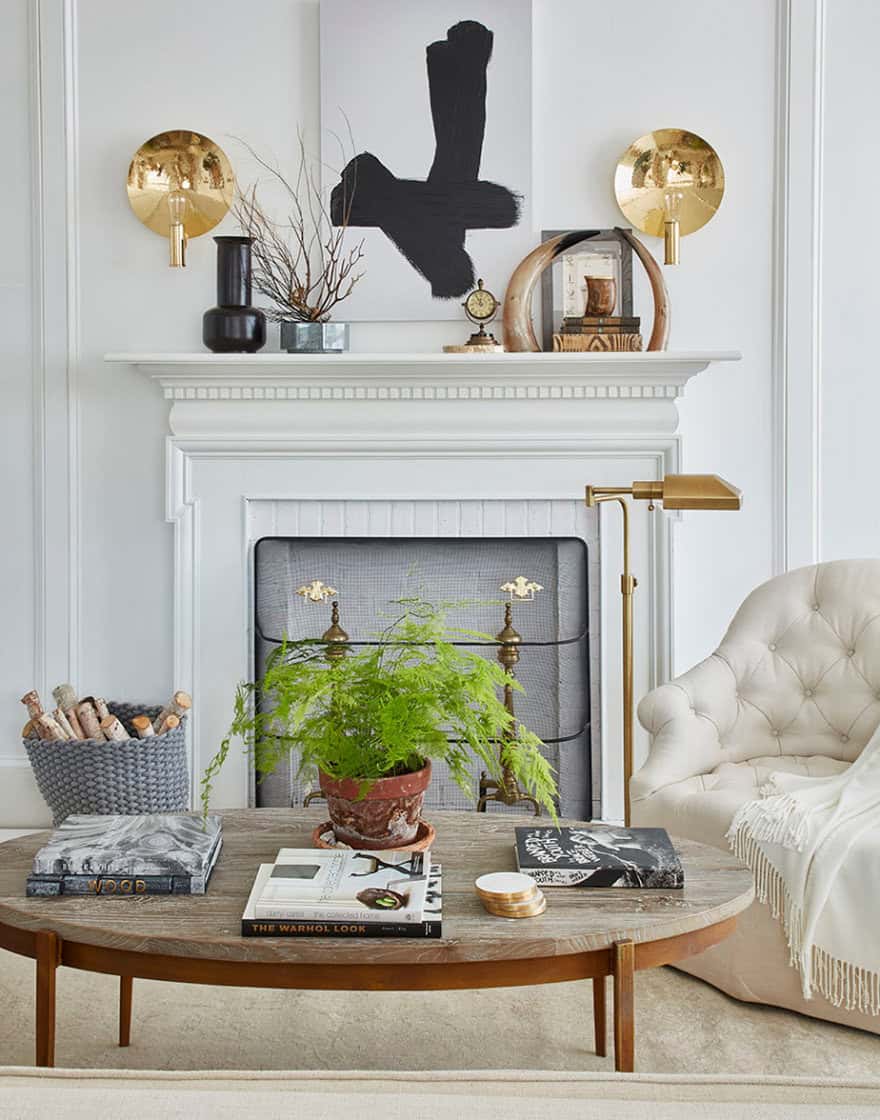 Living room set with faux fireplace in neutral tones