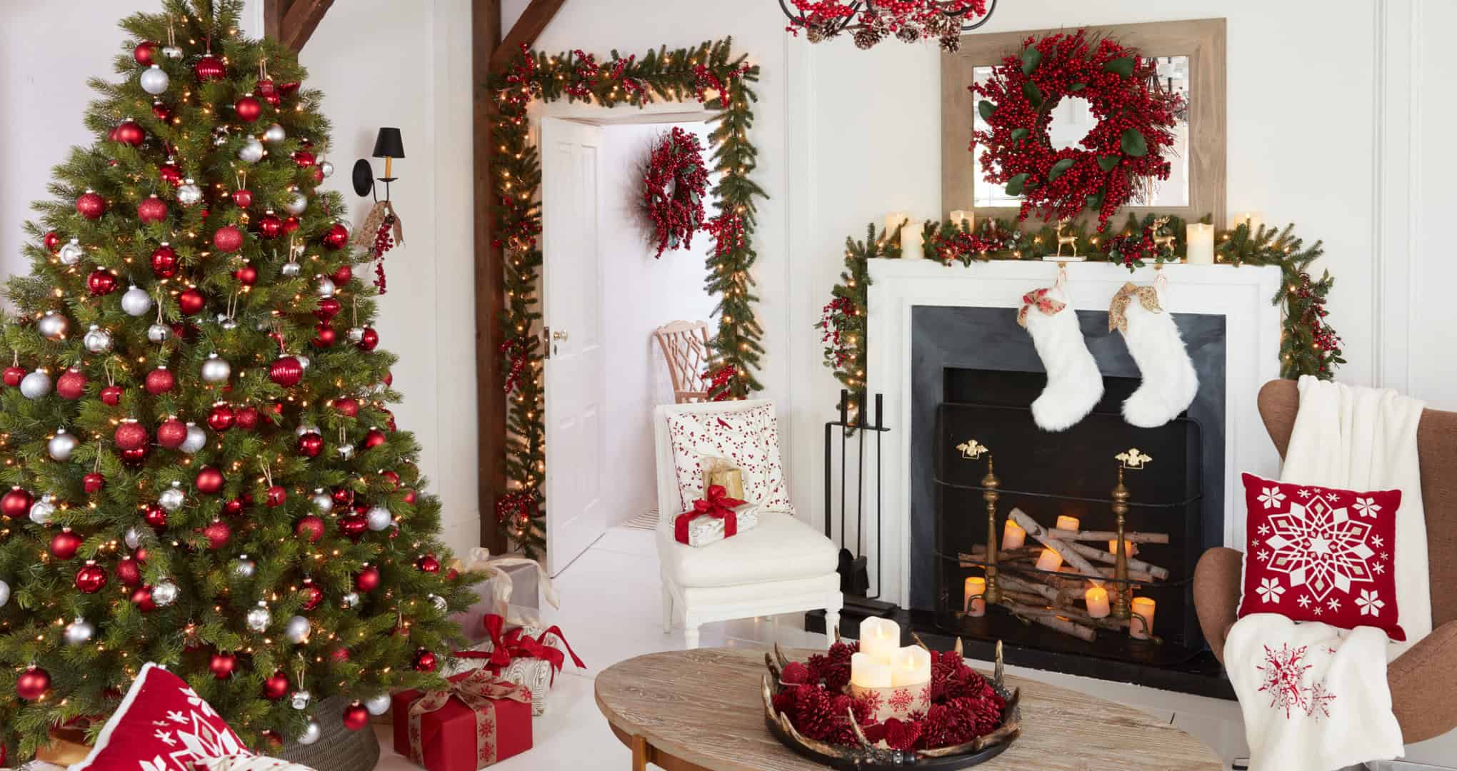 Scando-inspired living room set decorated for Christmas in red and white