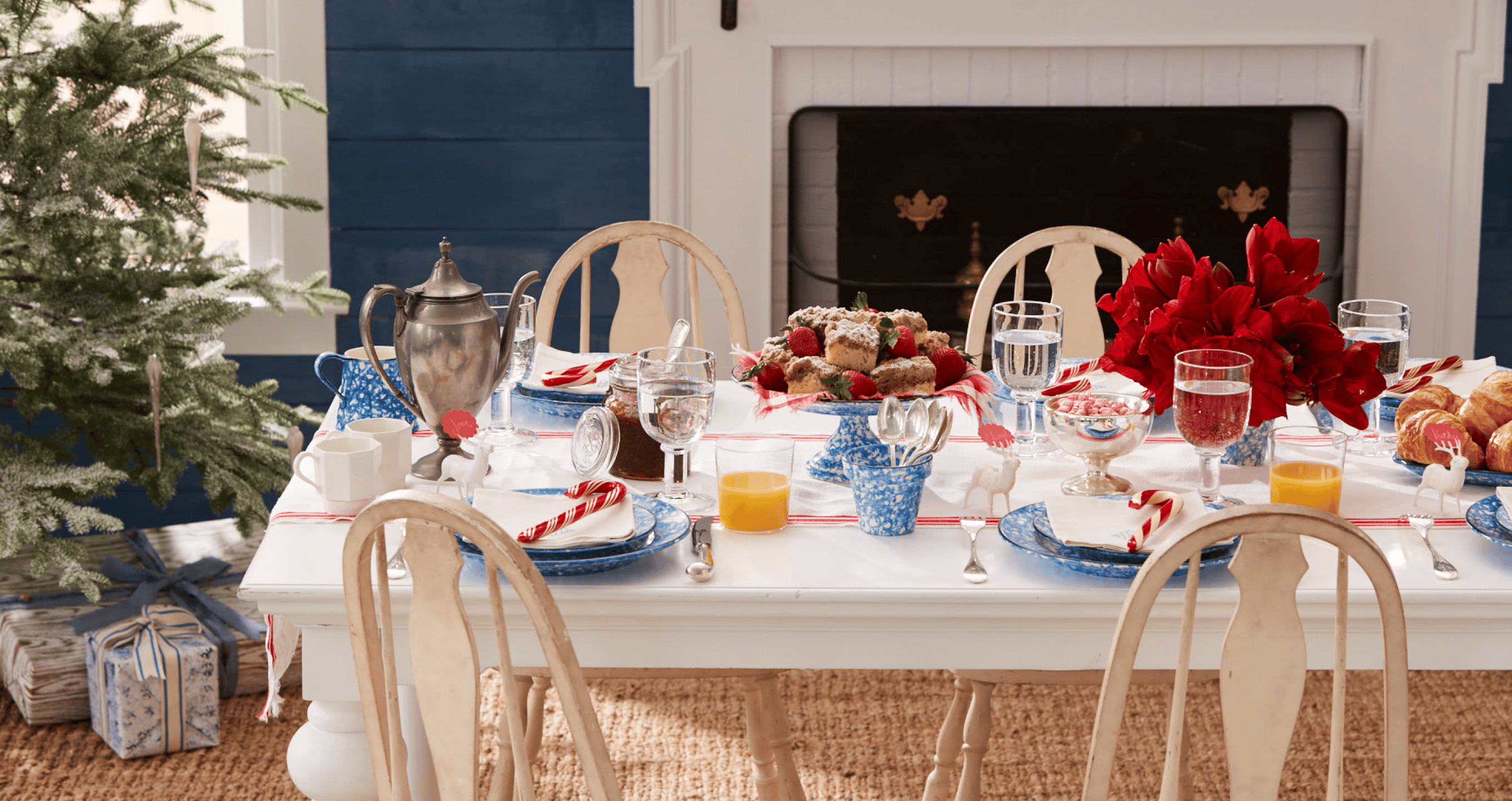 Dining room set with fireplace and table set for Christmas breakfast