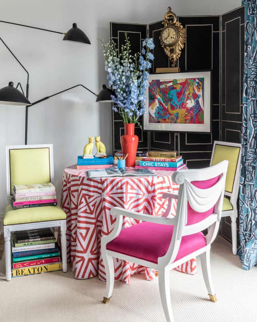 Colorful corner of a bedroom set with table and chair