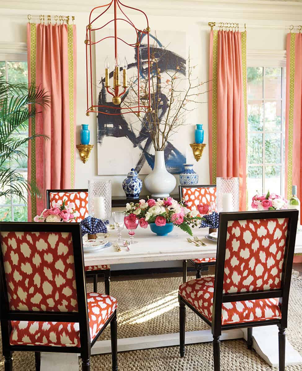 Foyer vignette with mirror and rattan console table