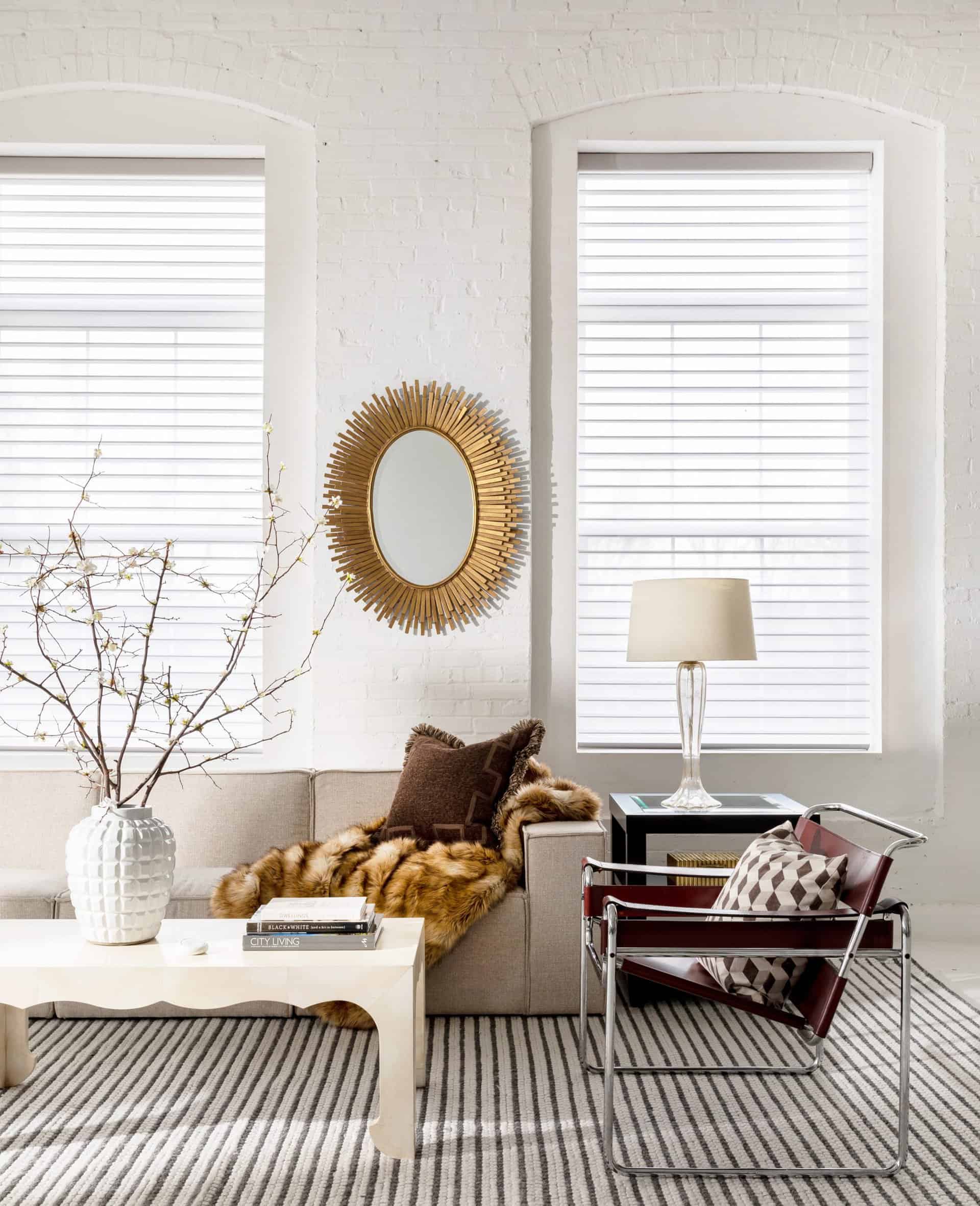 Modern living room set in our Gallery studio with automated shades on windows