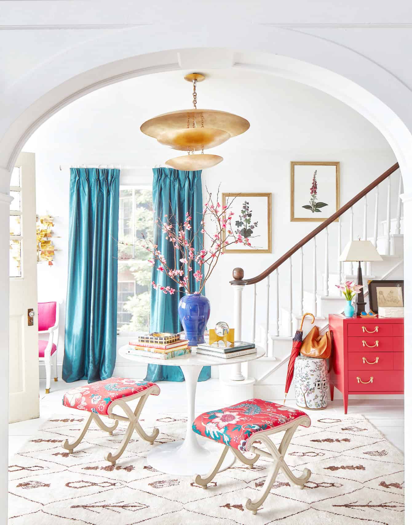 Foyer set with stairs as though in a New York townhouse