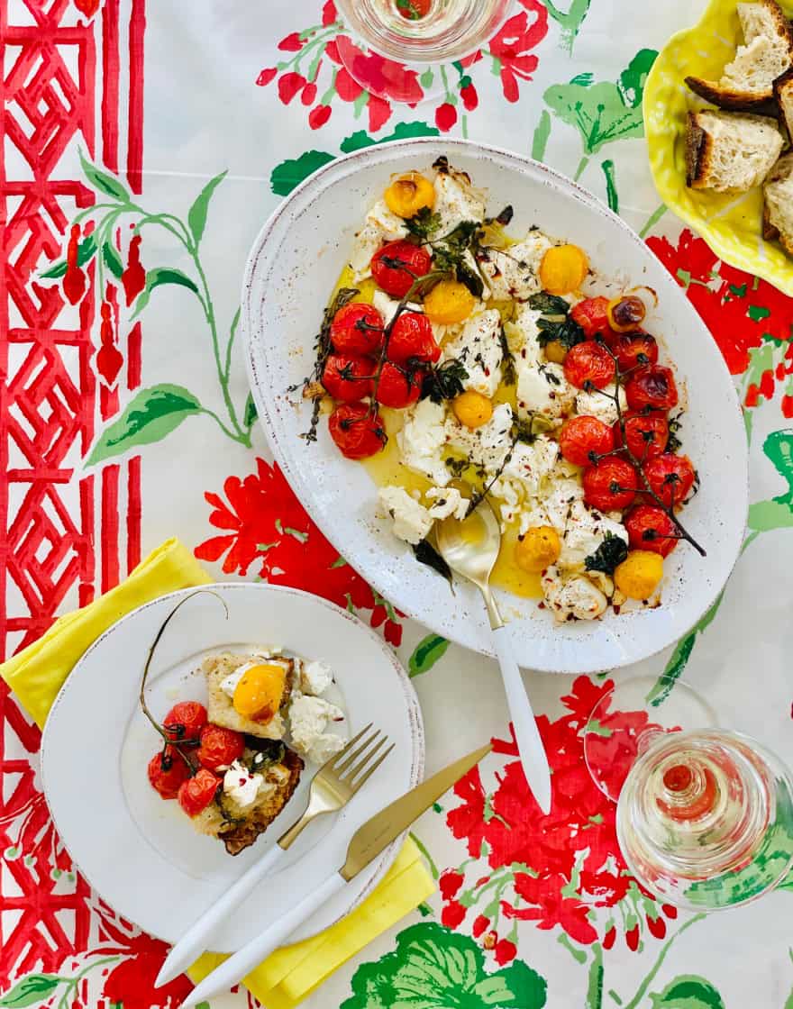 Overhead of tomato and ricotta appetizer served onto individual plate