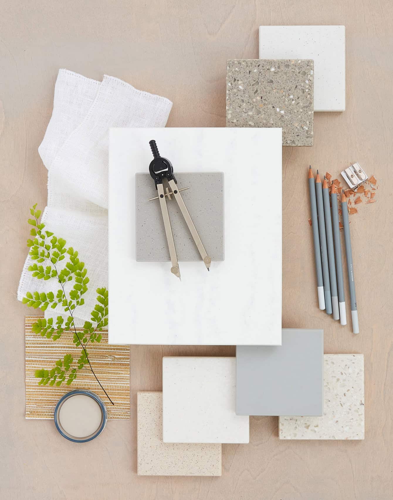 Overhead shot of architectural surfaces with interior design studio concept