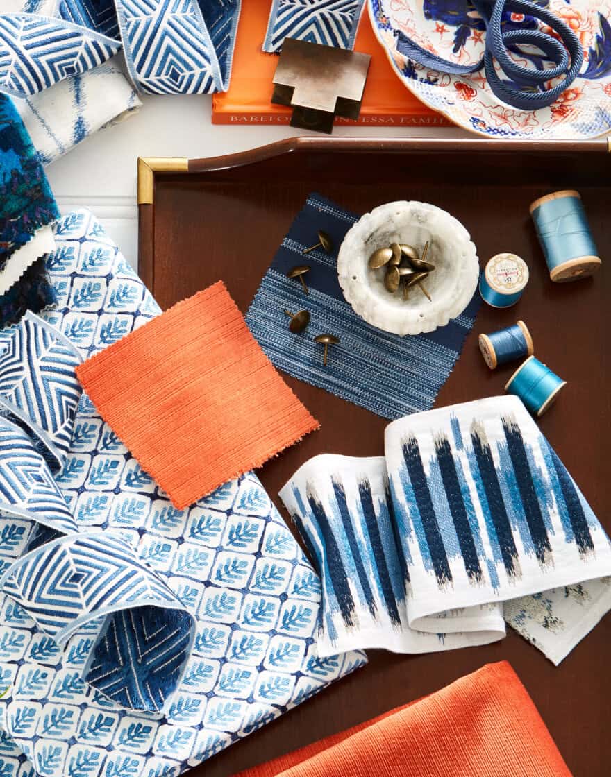 Overhead of room scheme in blues with pops of orange