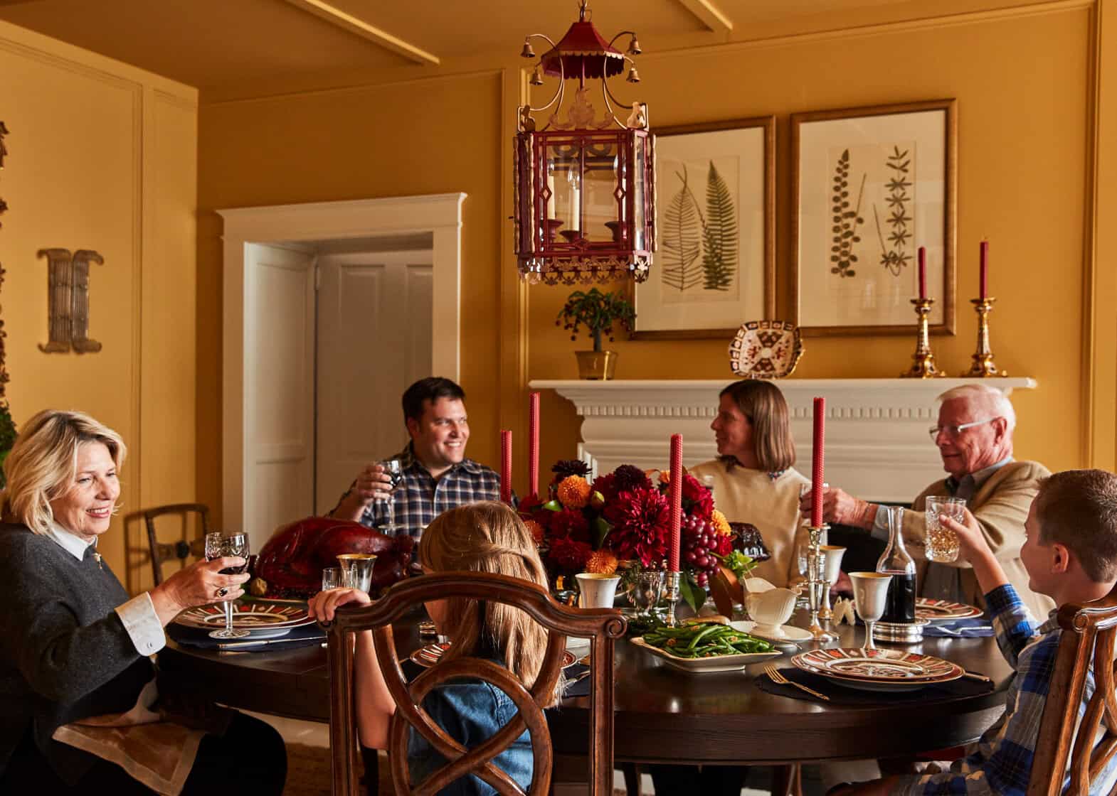 Dining room set with family enjoying Thanksgiving dinner